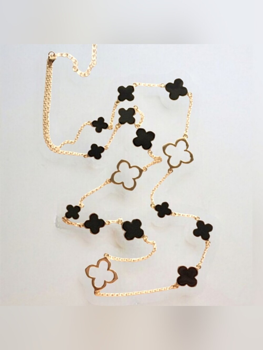 Stylish Black Quatrefoil Clover Necklace with Gold Cutouts - 40 Inches